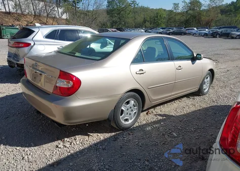 2002 Toyota Camry Le z USA, uszkodzony, nr VIN 4T1BE32K52U042634